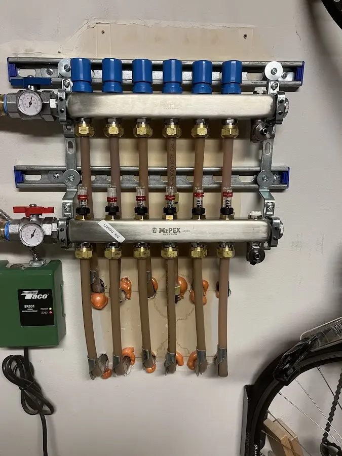 Plumber performing Water Heater Repair at a residential property in Lexington Park